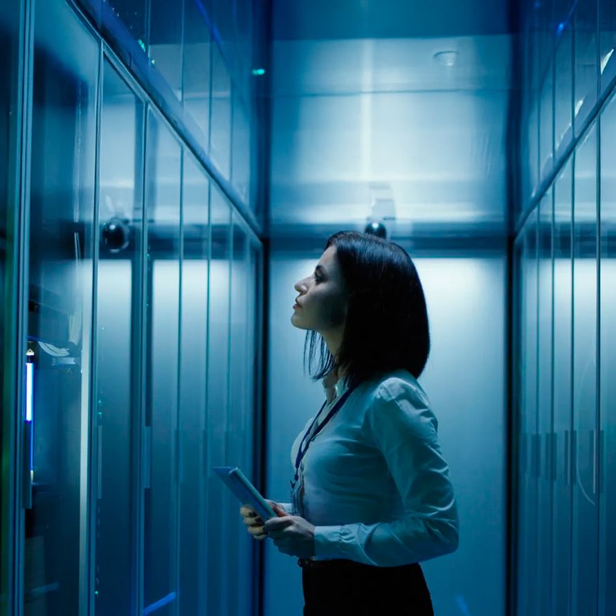 IT professional in a data center manages server backups