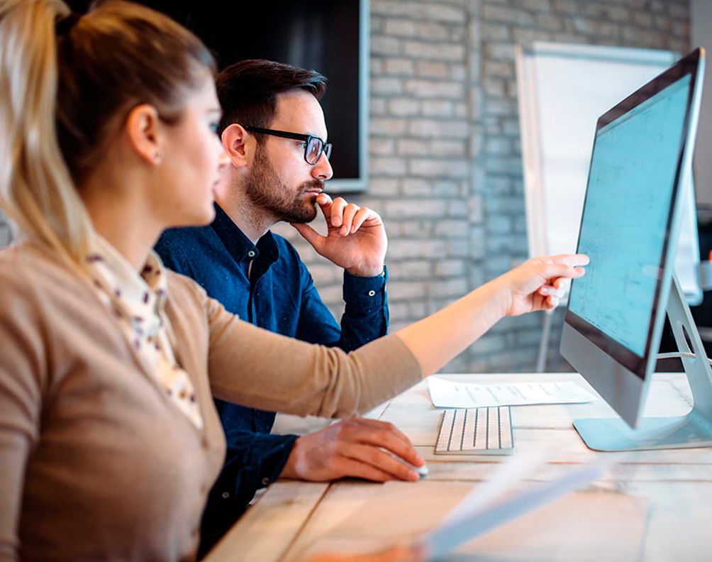 An expert explains to her colleague why it's important to have backup copies of your PC.