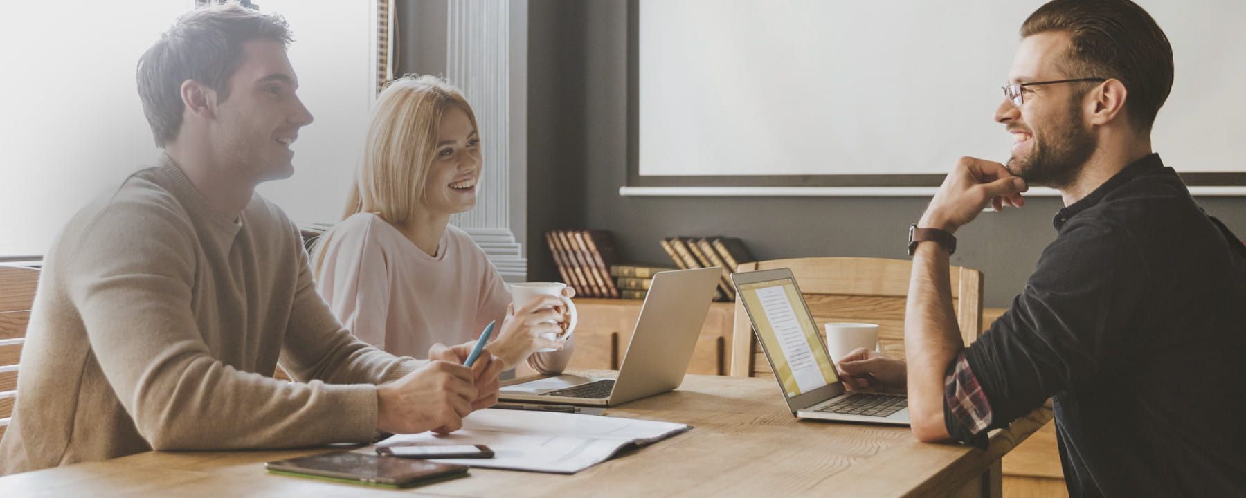 Meeting of coworkers deciding on the names of their professional emails