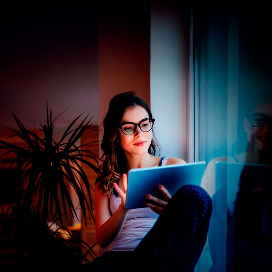 Girl searches for the domain for her online project on a tablet