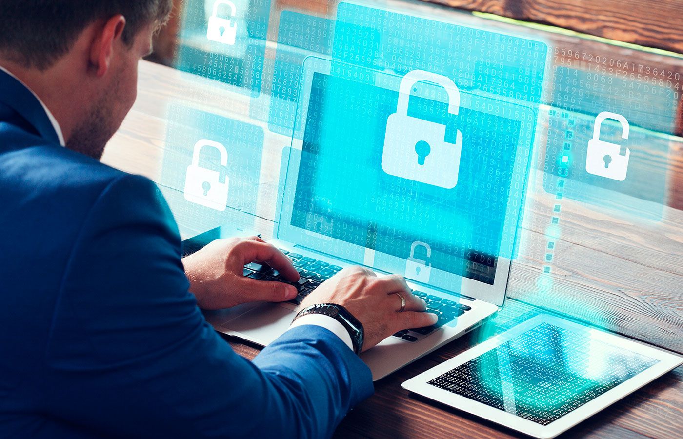 Boy consults his computer to learn about protection against domain cybersquatting