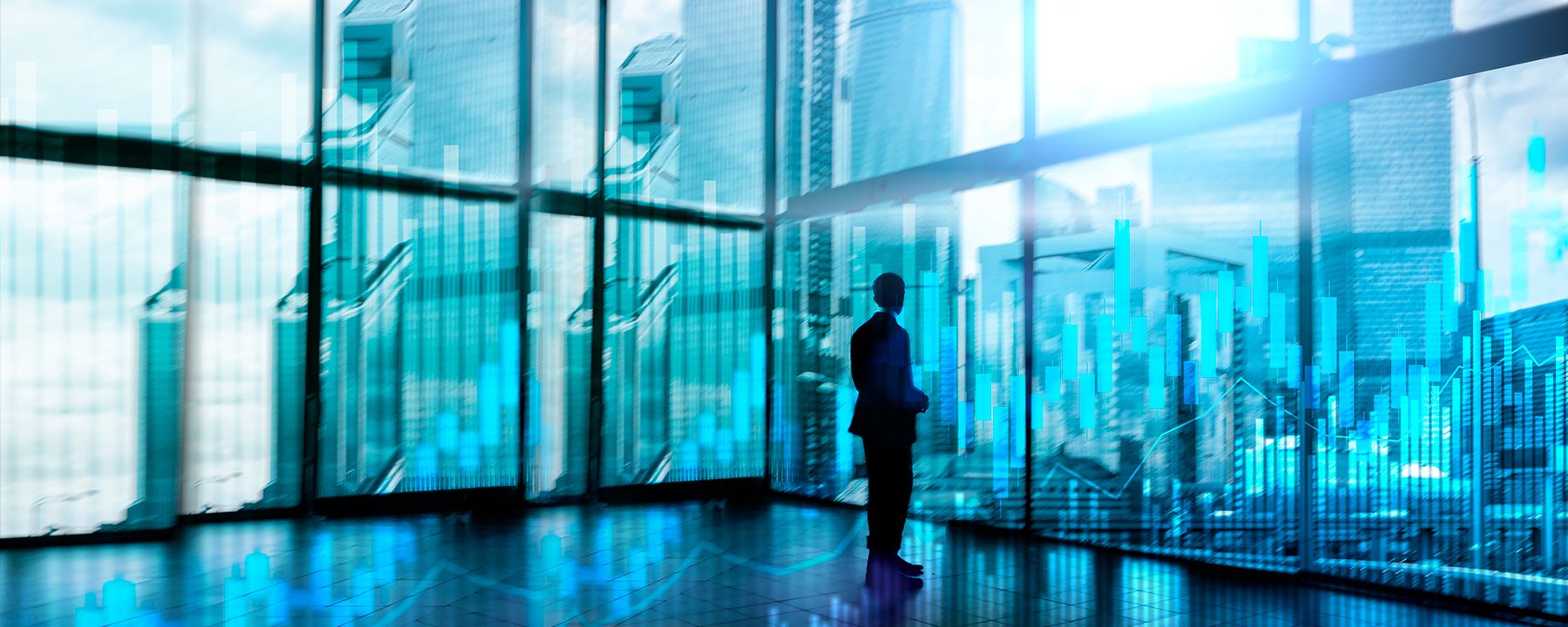 Man in a glass-enclosed office
