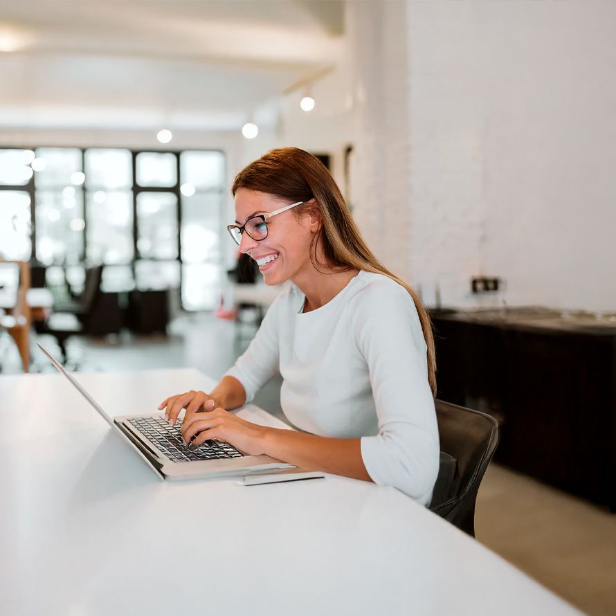 Girl looking at her computer to see how she can protect her domain data