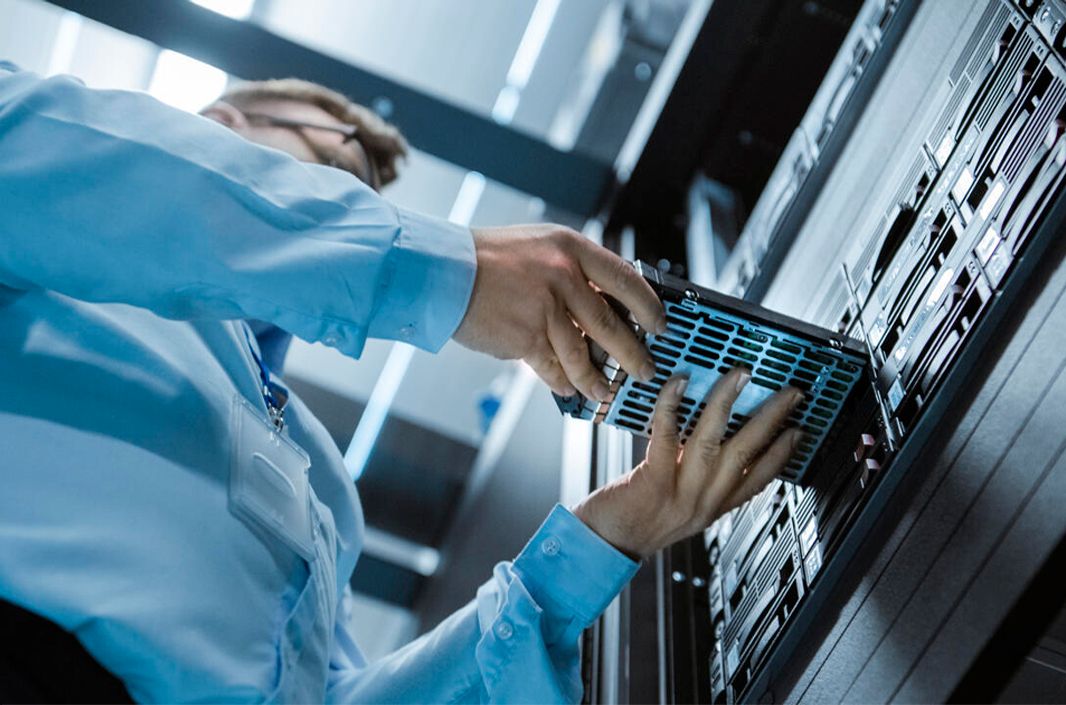 IT Professional in a data center with PrestaShop Hosting