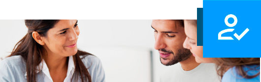 A discussion among colleagues about IT Compliance to help them meet their business's IT security regulations.