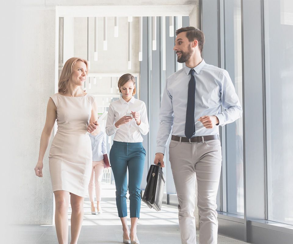 Professionals walking through the Arsys data center