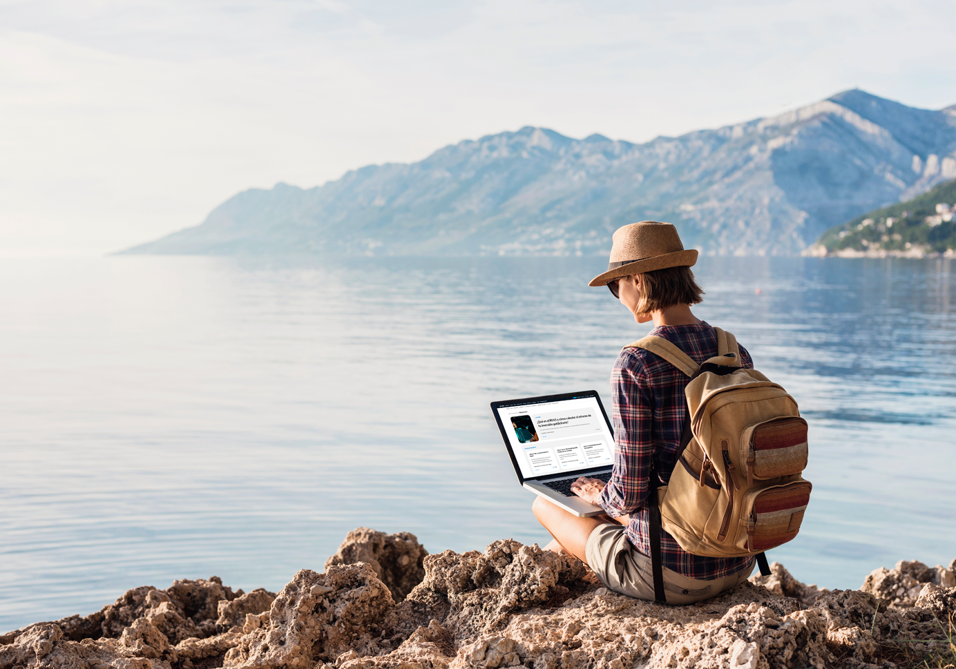 Girl with laptop working in nature