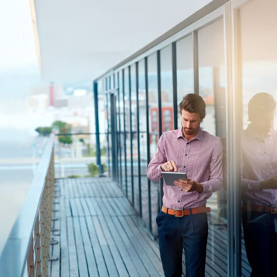 Boy reads on his tablet about Arsys' commitment to sustainability and corporate social responsibility.