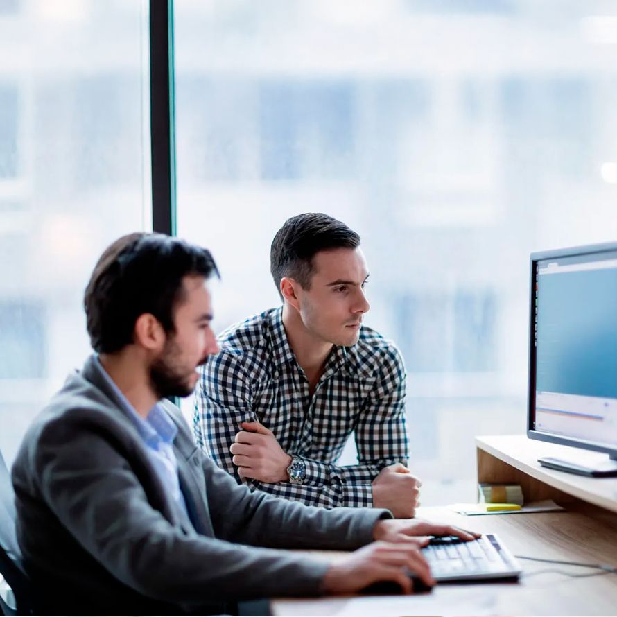 Two boys look up information about Gaia-X on their computer
